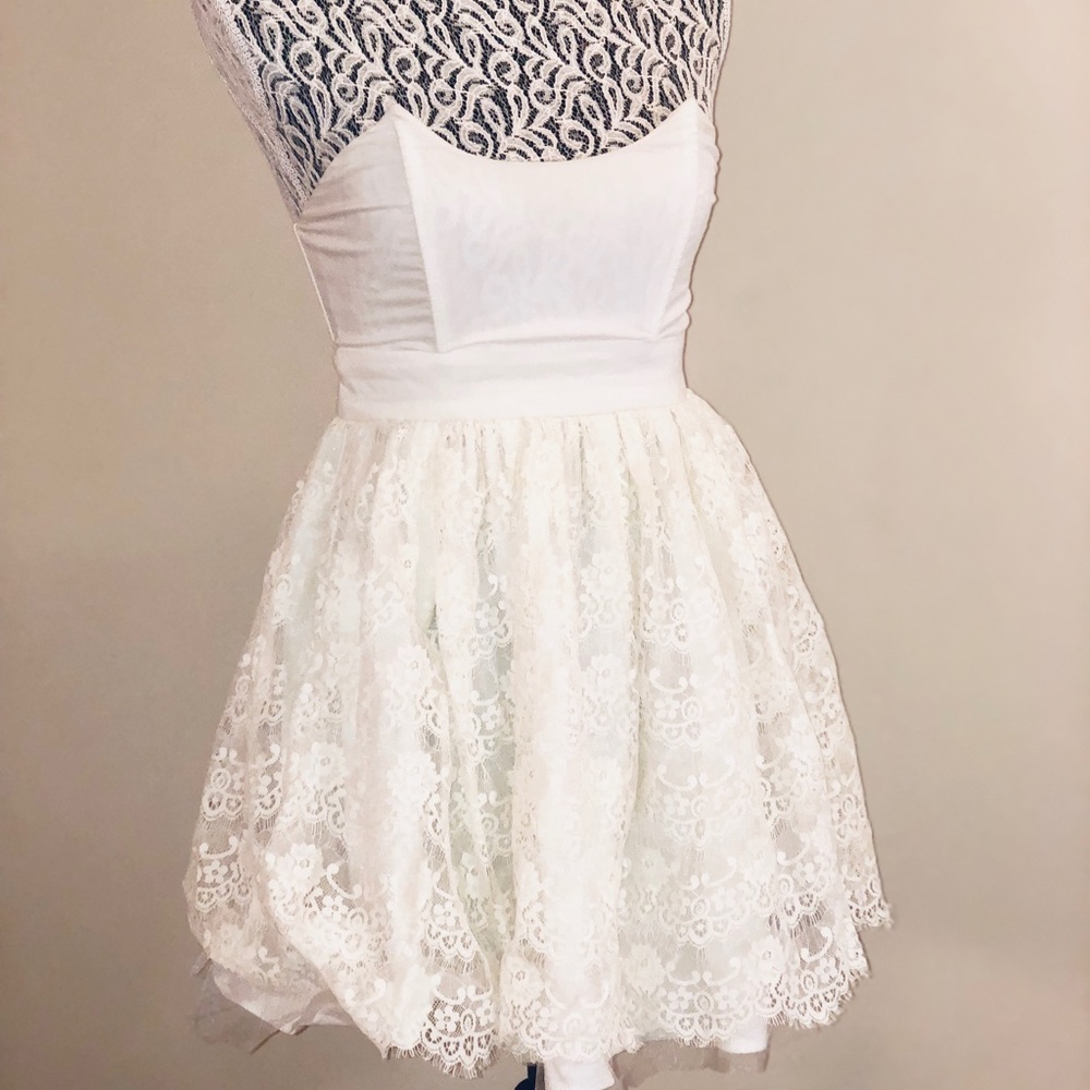 Structured, lace off white dress.